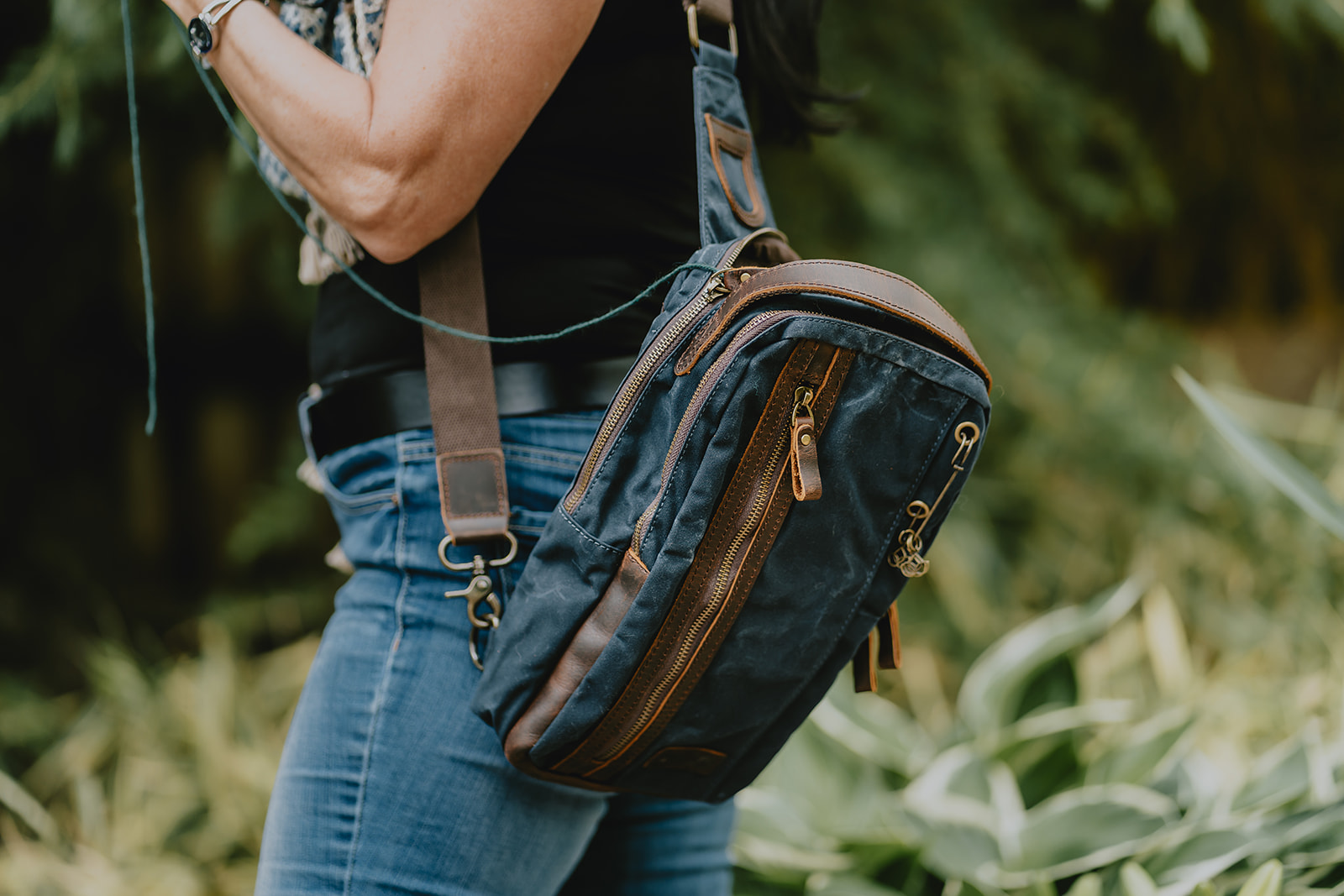 Delta sling 2024 mini messenger bag